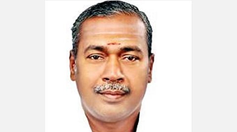 கைதான நகர அதிமுக செயலாளர் அசோக்குமார்.
