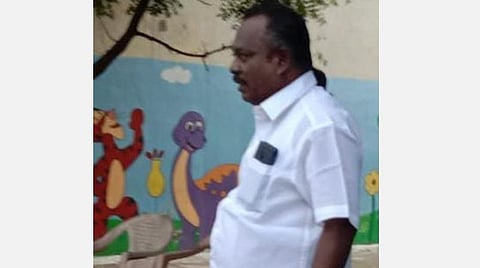 பணியிடை நீக்கம் செய்யப்பட்டவர்.