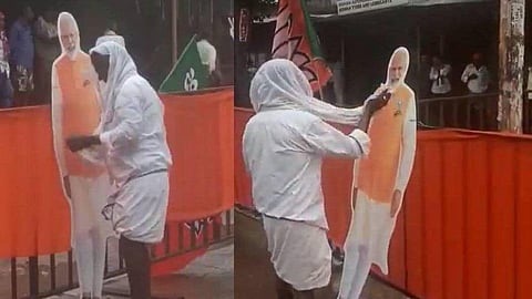 மழையில் நனைந்த பிரதமர் மோடியின் ‘கட் அவுட்’டை துடைத்த முதியவர் - அமித் ஷா வீடியோவை பகிர்ந்து நெகிழ்ச்சி