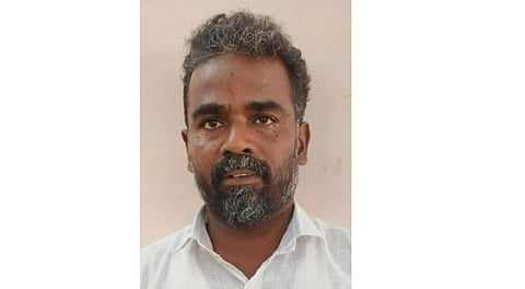 கைதான தேவேந்திரன்.