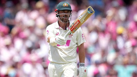 Travis Head celebrates