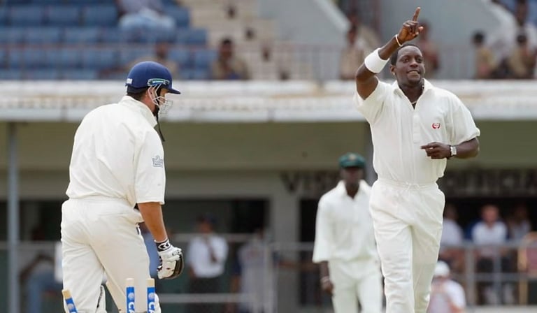 ஐசிசி - ஆஸி. கூட்டணி ஒழித்த   பவுலர் ஜெர்மைன் லாசன்  - இவரை பற்றி தெரியுமா?