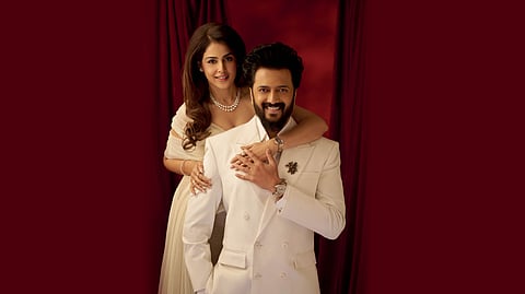 ON GENELIA:
Titan Watch
Supriya Munjal Outfit
Ekaraa jewellery Jewellery

ON RITEISH:
Titan Watch
Jayesh and Kajaal Shah Outfit
Azga Brooches.