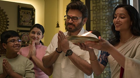 A still from 'Aadarsha Kutumbam - AK47' 