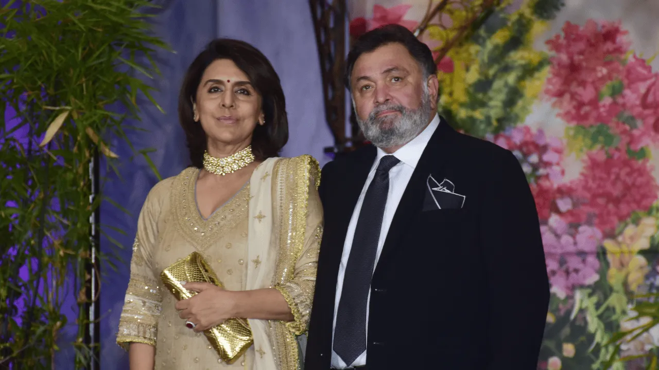 Rishi Kapoor with wife Neetu Kapoor attend the wedding reception of actress Sonam Kapoor and Anand Ahuja at hotel Leela in Mumbai. 