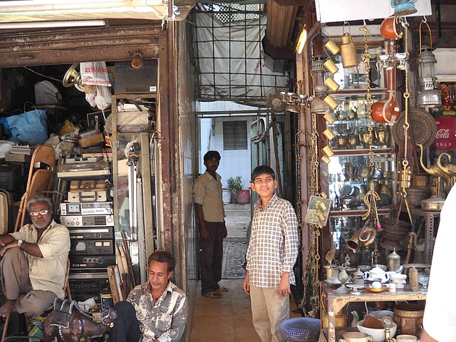 A busy and cluttered antique shop.