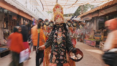 Sonali's camera luxuriates in religious mise-en-scène: the saffron, the incense, the riverside practiced gestures, while never losing sight of the transactions that animate those images. 