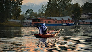 A representative image of a woman on Dal Lake 