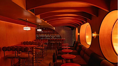 Built around the “rule of five,” the bar programme serves inventive cocktails and communal punch bowls designed to encourage conversation and shared experiences.
