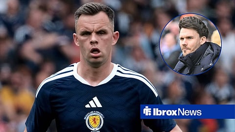 Lawrence Shankland in action for Scotland while looking at Rangers manager Danny Rohl.