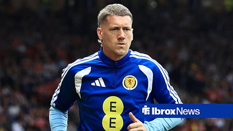 Jim McAlister working as Scotland's kitman