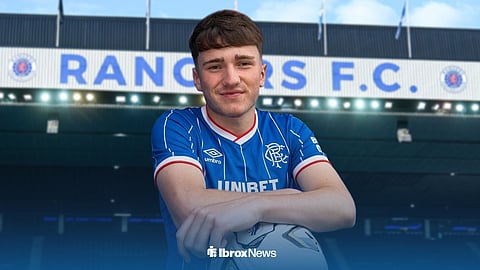 Rangers teenager Coben Fergusson in front of Ibrox stadium