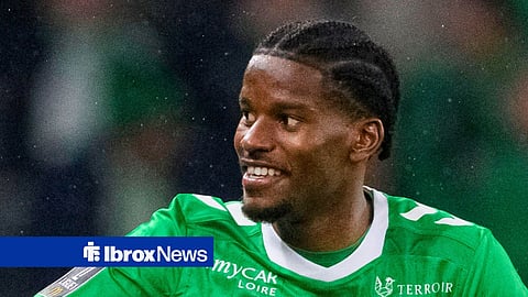 Pierre Ekwah smiling while playing for Saint-Etienne in the rain