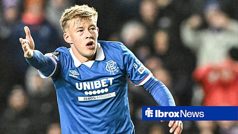 Connor Barron gesticulating whilst in action for Rangers at Ibrox Stadium