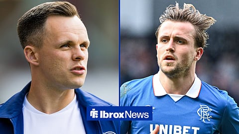 Lawrence Shankland looking on with Tuur Rommens in action for Rangers