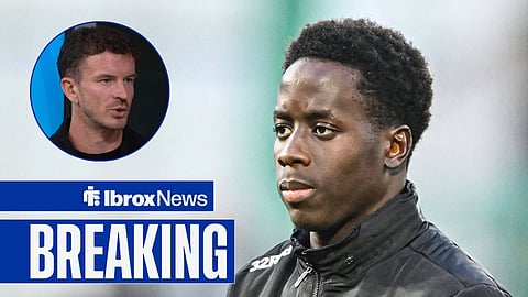 Andy Halliday on a panel whilst looking in the direction of Rangers player Djeidi Gassama in a training jacket.