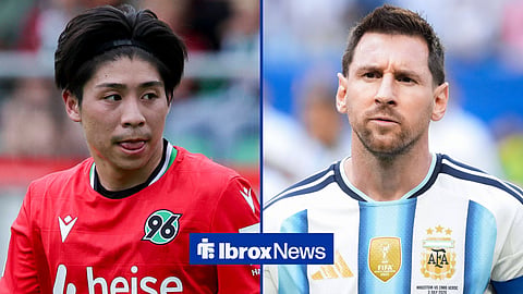 Daisuke Yokota in action for Hannover and Argentina's Lionel Messi