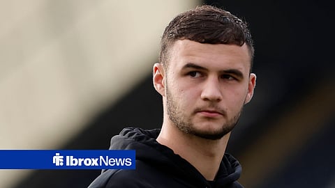 Rangers goalkeeper Mason Munn during loan spell with Dunfermline Athletic inspecting the pitch
