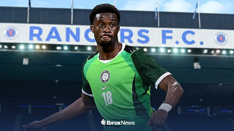 Emmanuel Fernandez in action for Nigeria, with Ibrox in the background