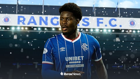 Rangers' Tochi Chukwuani with snow falling around him and Ibrox background