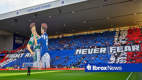 Rangers fans with their banner for the Old Firm derby in the Copland Stand at Ibrox