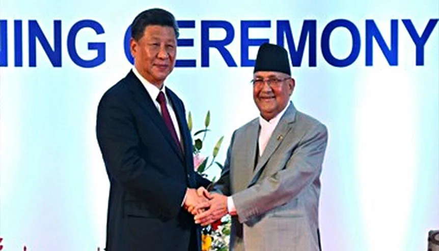 Chinese President Xi Jinping with Nepalese Prime Minister K.P. Sharma Oli. The latter is now reaching out to India to further bilateral ties through economic engagement.