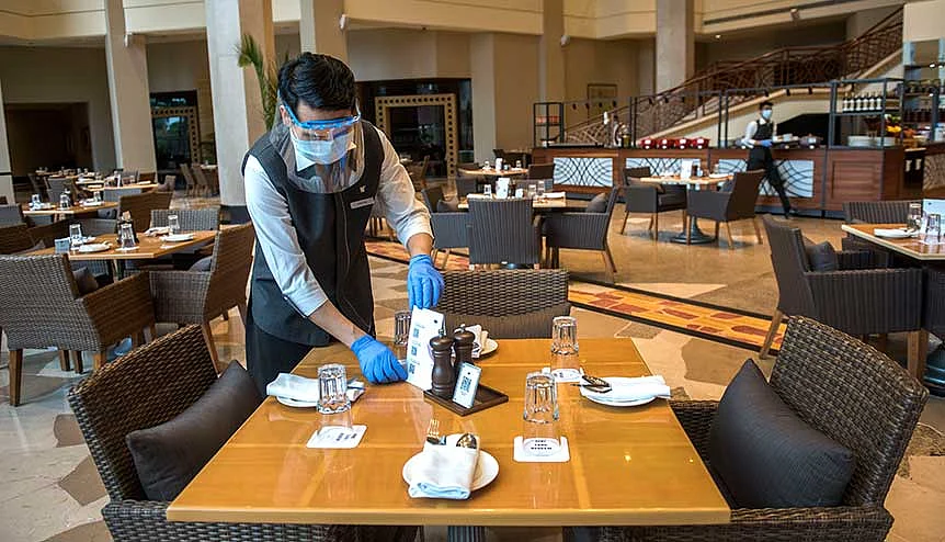  Staff members at J W Marriott, Juhu following safety guidelines after the Indian Government on allowed hotels to commence operations. The hotel industry is scrambling to inspire consumer confidence while working to safeguard both guests and employees against Covid-19. 