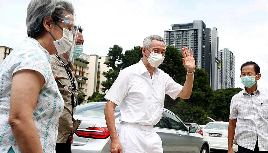 Singapore PM Lee Hsien Loong and his wife Ho Ching at a polling station during Singapore′s general election. The premier leader believes that India's ties with Singapore are strong, substantive and broad-based.