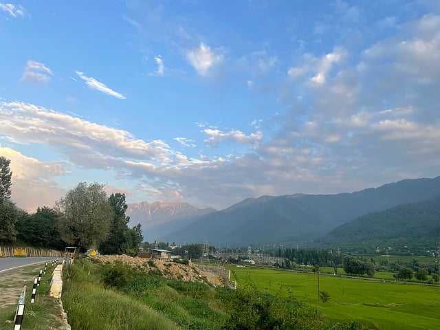 A new road overlooks the valley, connecting towns but also paving the way for construction on what was once fertile farmland.