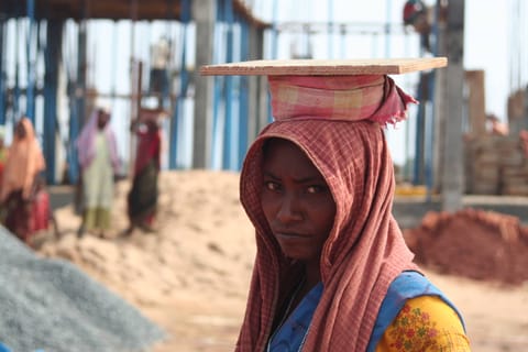 A woman worker at a construction site in Bhubaneshwar- Orissa- India.