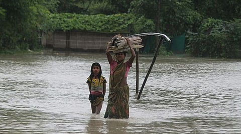 Adolescent girls suffer the most during floods in Assam. Image Source: IWP Flickr photos.