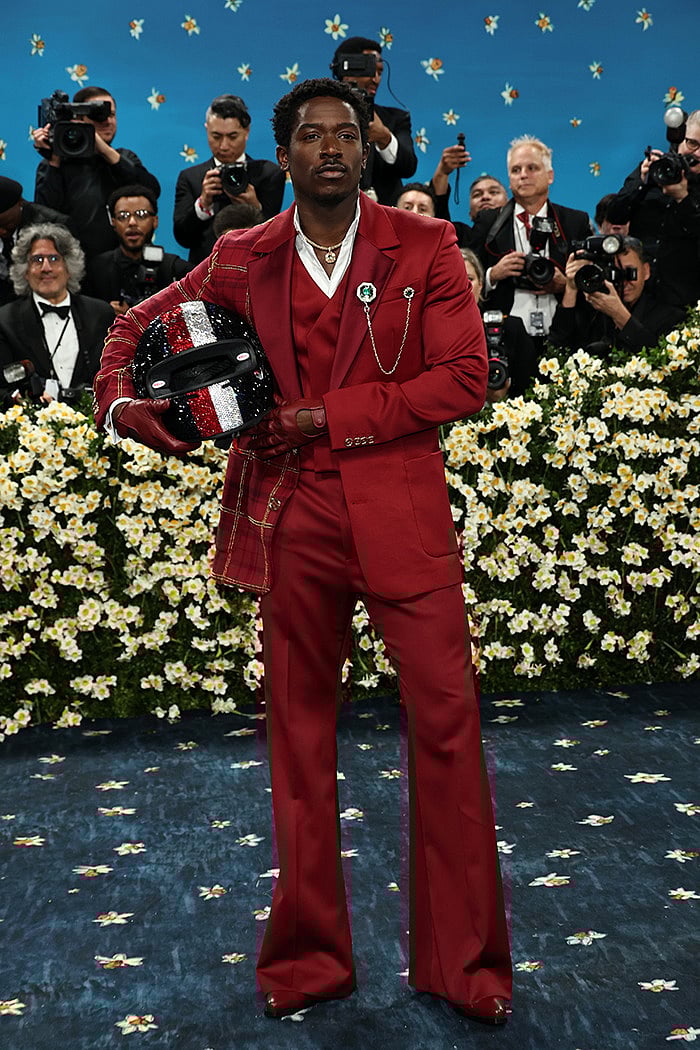 Damson Idris Stuns At 2025 Met Gala In Racing Suit Turned Tommy 2025 05 06 627w70uk Damson Idris Met Gala 3 Png700 