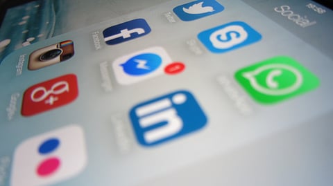 Social media networks in one group on iPhone.