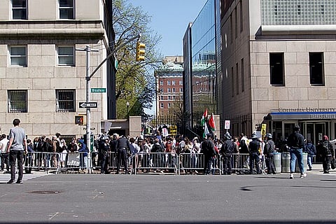 Protests in and around Columbia University in support of Palestine and against Israeli occupation. A side gate by the bookstore where the crowd is—inside and out.