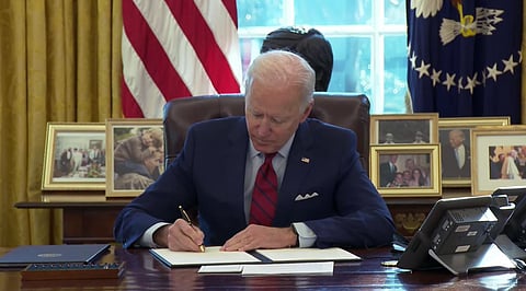 Biden signing an executive order related to the Affordable Care Act and Medicaid January 2021