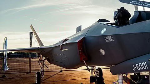 Lockheed Martin F-35 from the swiss army stands at sunset at Zurich Airport.