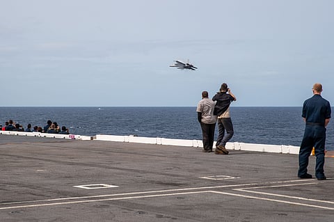 F/A-18 Super Hornet performs a fly-by of USS Gerald R. Ford (CVN 78)