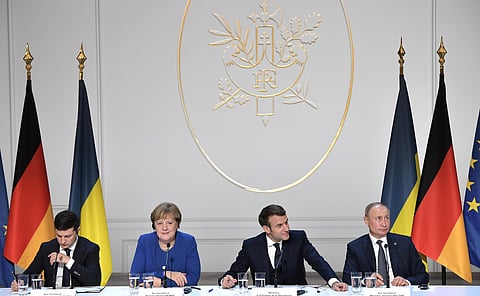 Ukrainian President Volodymyr Zelensky, German Chancellor Angela Merkel, French President Emmanuel Macron and Russian President Vladimir Putin, 2019. 