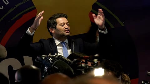 André Ventura makes a speech on the night of the 2022 Portuguese legislative elections.