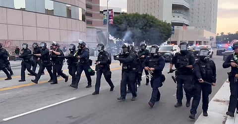 ICE raids across Los Angeles on June 6, 2025, trigger protests and confrontations with riot police.