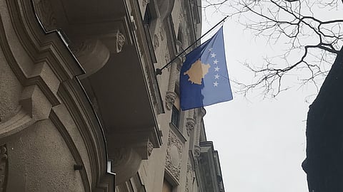 Kosovo flag on a building for illustrative purposes