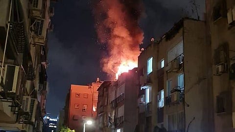 A missile strike in Holon, near Tel Aviv, caused by an Iranian ballistic missile barrage on June 19, 2025.