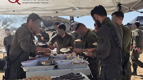 Amidst a crippling Israeli blockade starving Palestinians and blocking vital aid, Israeli forces stage an extravagant buffet for combat engineering units in the devastated ruins of Rafah.