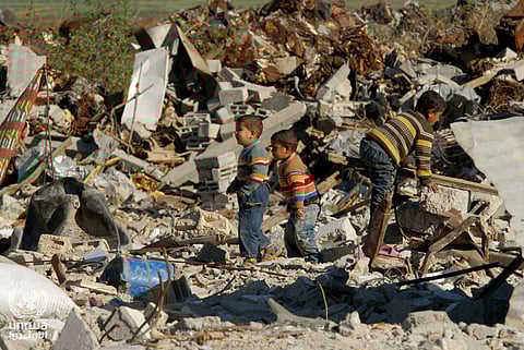 Boys in the ruins of Gaza