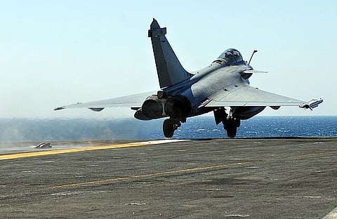 French Navy Rafale jet launches from the flight deck of the aircraft carrier USS Harry S. Truman (CVN 75) during carrier launch and recovery qualifications.