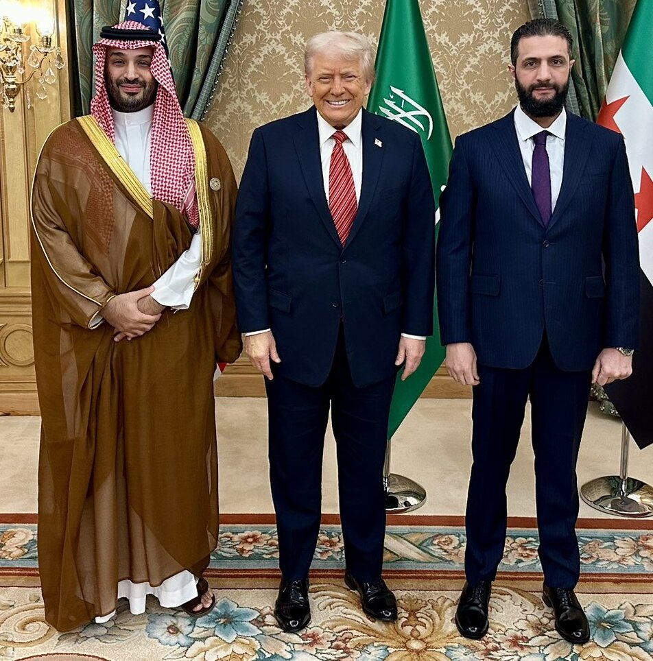 President of the United States Donald Trump with Saudi Crown Prince Mohammed Bin Salman and President of Syria Ahmed al-Sharaa during Donald Trump's state visit to Saudi Arabia.
