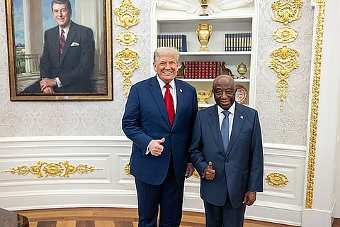 President Donald Trump greets President Joseph Nyuma Boakai of Liberia in the Oval Office, Wednesday, July 9, 2025, before a multilateral luncheon with African leaders.