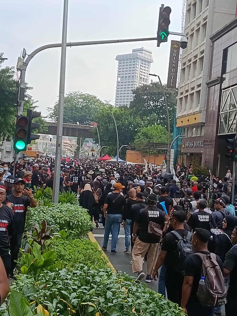 Thousands rally in Kuala Lumpur demanding Prime Minister Anwar Ibrahim’s resignation over rising living costs.