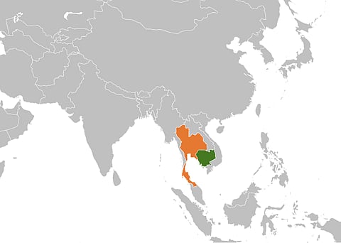 Cropped map of the world highlighting Cambodia in green and Thailand in orange.