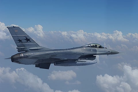 A Royal Thai Air Force F-16 Fighting Falcon aircraft conducts tactical flight operations during Cope Tiger 13 at Korat Royal Thai Air Force Base, Thailand, March 12, 2013.